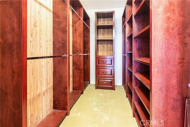 Two Master Walk-In Closets
