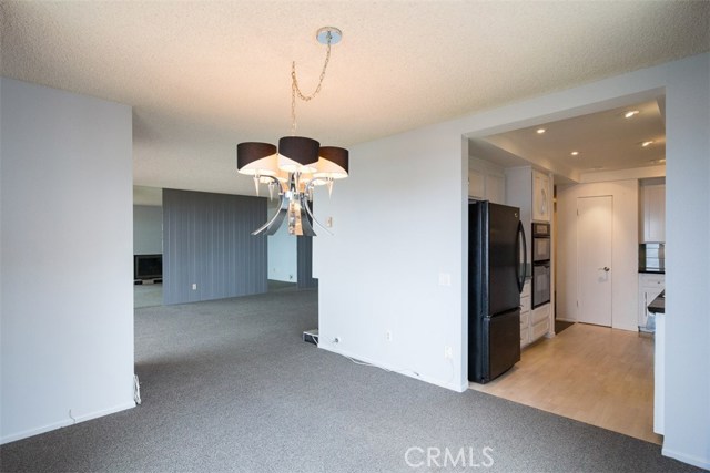 Dining Area Adjacent to Living Room & Kitchen