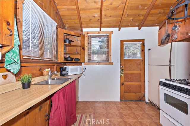 Kitchen with door to backyard.