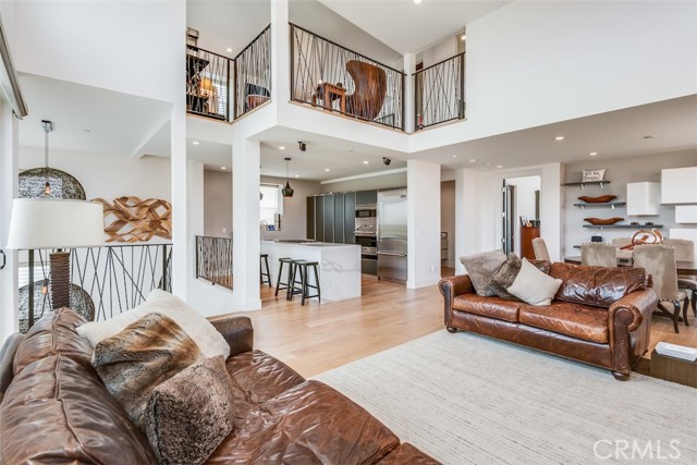 Incredible open layout with soaring ceilings and dramatic mezzanine level