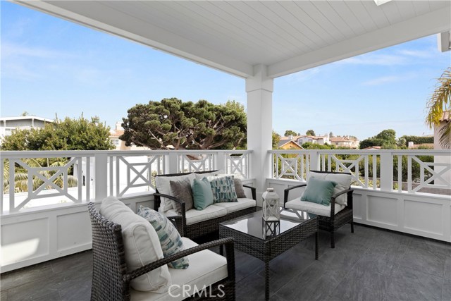 Through the French doors of the Master suite is this private, covered balcony