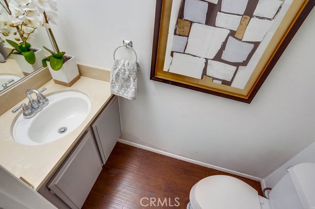 bathroom on entry level just inside the front door 
