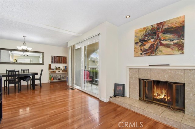 Unit B Fireplace and Balcony in Living Area