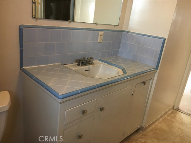 Bath has a tub and a shower