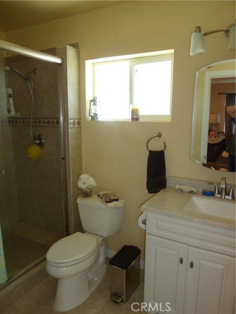 Master bath with large walk-in shower. Master bath with large walk-in shower.