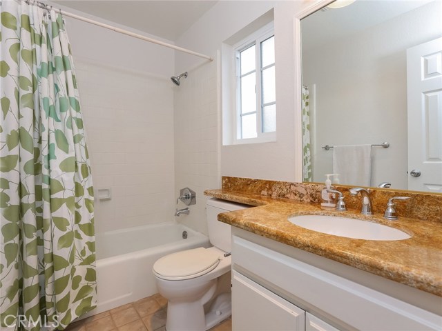 Second master bath with granite counter and walk-in tub/shower