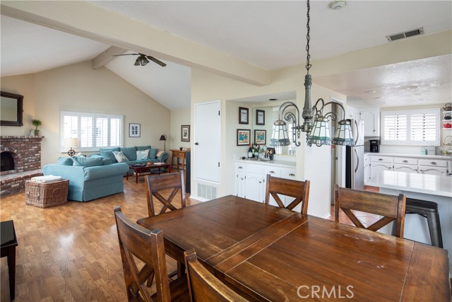 Dining area can also enjoy the fireplace