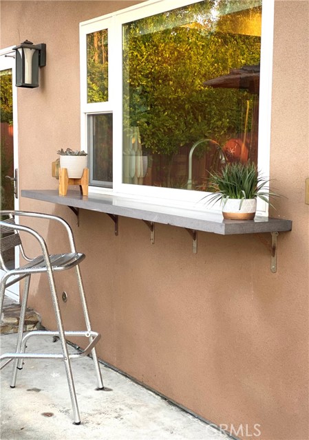 Clever and practical pass-through feature with bar for entertaining.