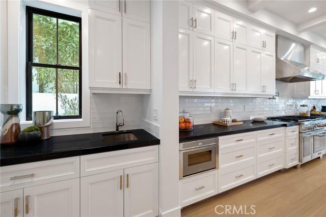 Custom cabinetry and carefully selected designer finishes are evident everywhere