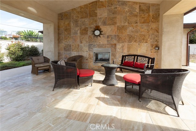 Outdoor entertaining area with fireplace