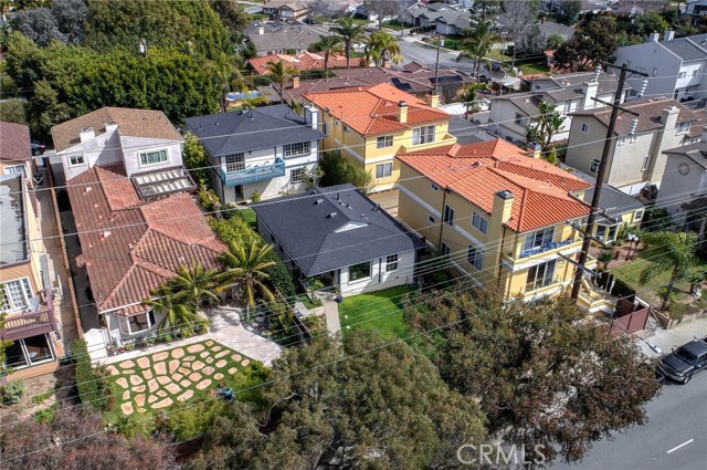 BEAUTIFUL DUPLEX ON A 6,465 SQ FT LOT!  (White home with gray roof)