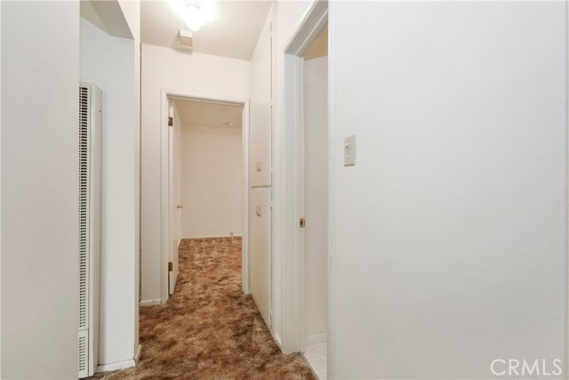 Unit B - Hallway Into Bedroom