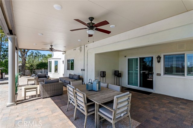 UPDATED COVERED PATIO IS AMAZING IN THE DAY OR EVENING.