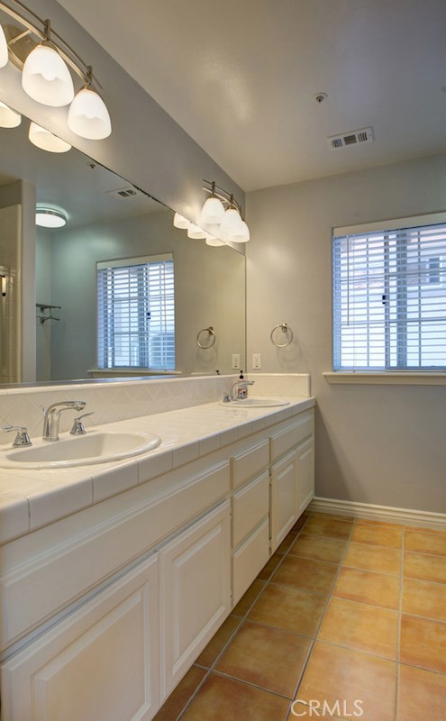 Common bath, tile floor and ample storage