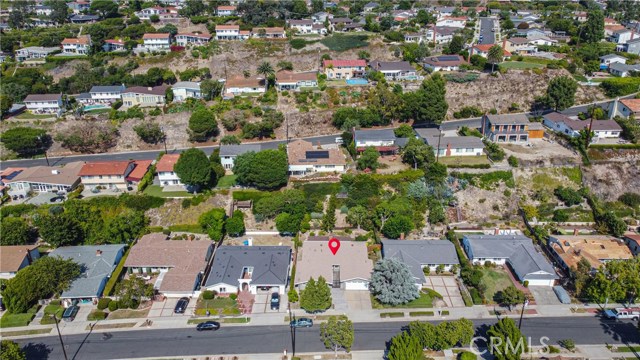 View down at property looking East. Eddinghill is the street above it.