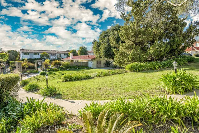 Lush landscaped grounds leading to pool Lush landscaped grounds leading to pool
