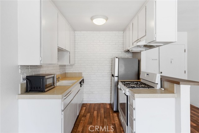 Kitchen with tile counters