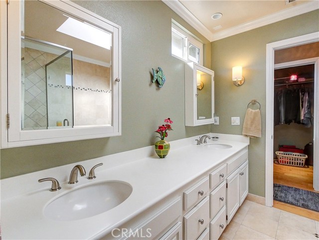 Double sinks and cabinets in the master bath.