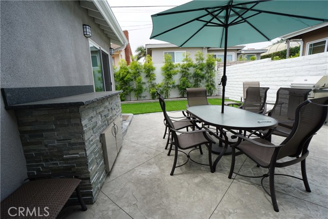 Patio with built-in service cabinet.