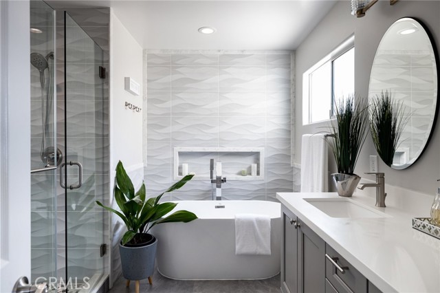 renovated like a Zen spa with a soaking tub, walk-in shower, and custom-designed finishes