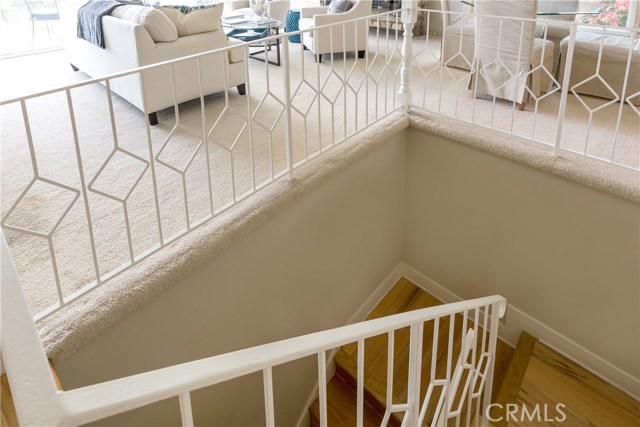 Leading downstairs to Family Room and 2nd Master Suite.