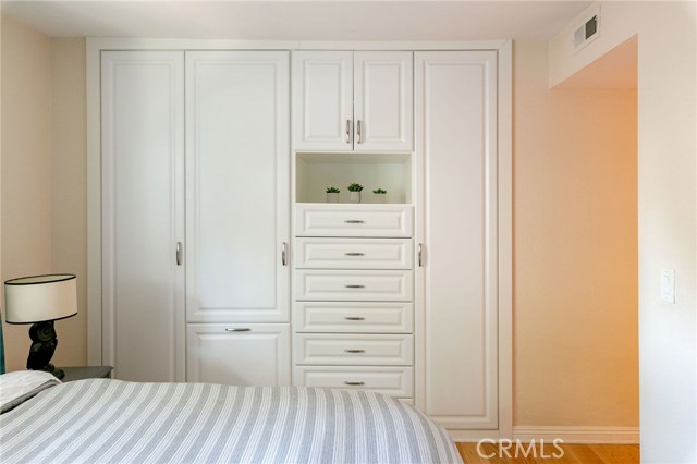 Custom built closet in Master bedroom