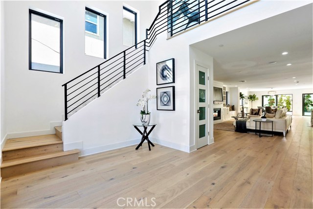 This Custom Estate is an Expression of  Unmatched Design, Character and Clean Lines featuring a combination of Glass, Metal, Stone, White Oak Planked Floors, Wood and Top Quality Appliances and Fixtures.