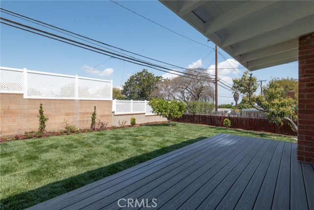 TREX DECK LOOKING EAST - ALL NEW GRASS, BACK, SIDE AND FRONT OF THE HOUSE