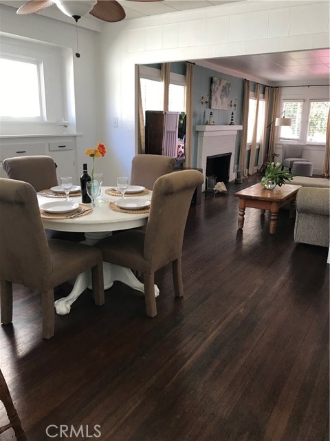 Dining area off of the living room. Nice hardwood floors.