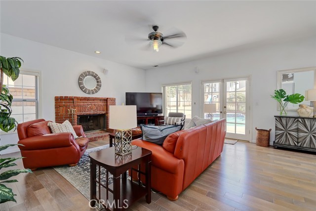 Family Room Area with Brick Fireplace