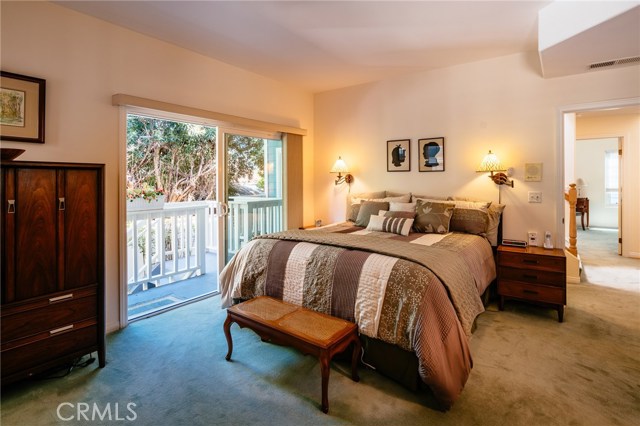 Master bedroom leading to rear yard