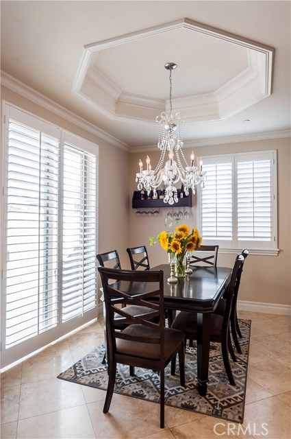 Sliding glass doors lead to the private backyard, perfect for outdoor entertaining!