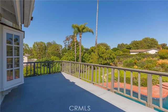 Balcony off of master bedroom overlooking the backyard.