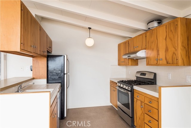 Kitchen in 2 bed 2 bath income unit