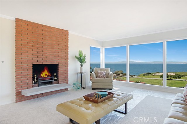 Living room with wood burning fireplace