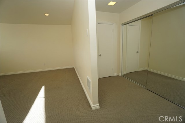 Master with dressing area and two large separate closets.