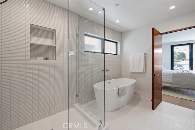 High style Master bath retreat with deluxe soaking tub and spacious walk in shower