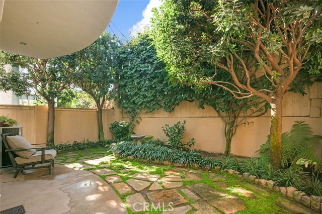 Oasis in the back yard with mature vegetation offering total privacy