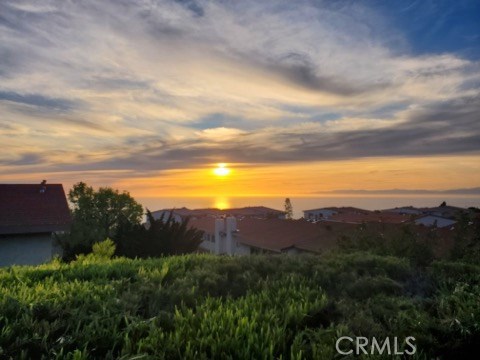Sunset view from living room patio. Sunset view from living room patio.