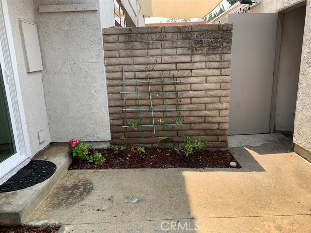 The patio between the garage and the main dwelling