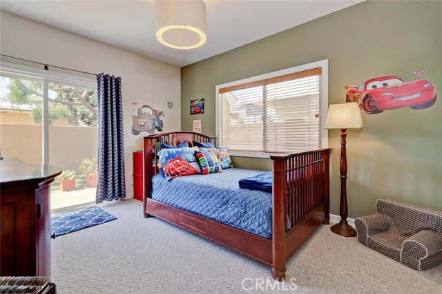 Second guest bedroom with walk-in closet.