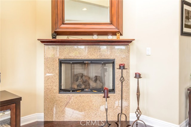 The living room fireplace adds warmth for one to enjoy!