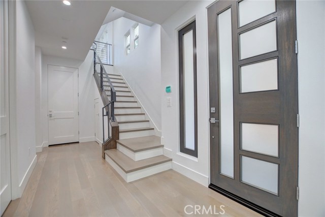 Entry . . . Access from Garage and staircase leading to 2nd level