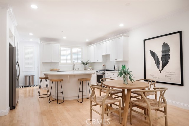 Lovely maple hard wood floors in living area.  Don't miss the rear deck off of the kitchen.