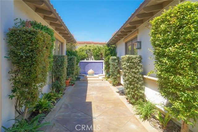 Courtyard entry with water fountain and TV Security