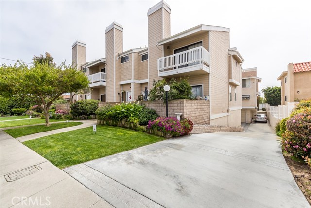 West end of complex and driveway leading to rear units