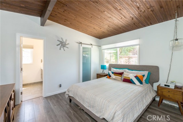 Upper level master bedroom with walk-in closet and en suite bath