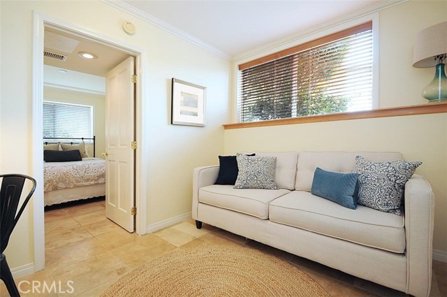 Downstairs den leading into 3rd bedroom.