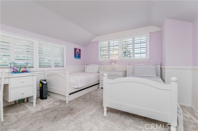 Bedroom #3 - This wonderful space is bright and spacious with ocean views. Classic details and ample closet space complete this bedroom.