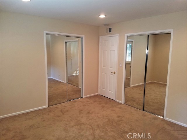 Upstairs bedroom 2 with two closets